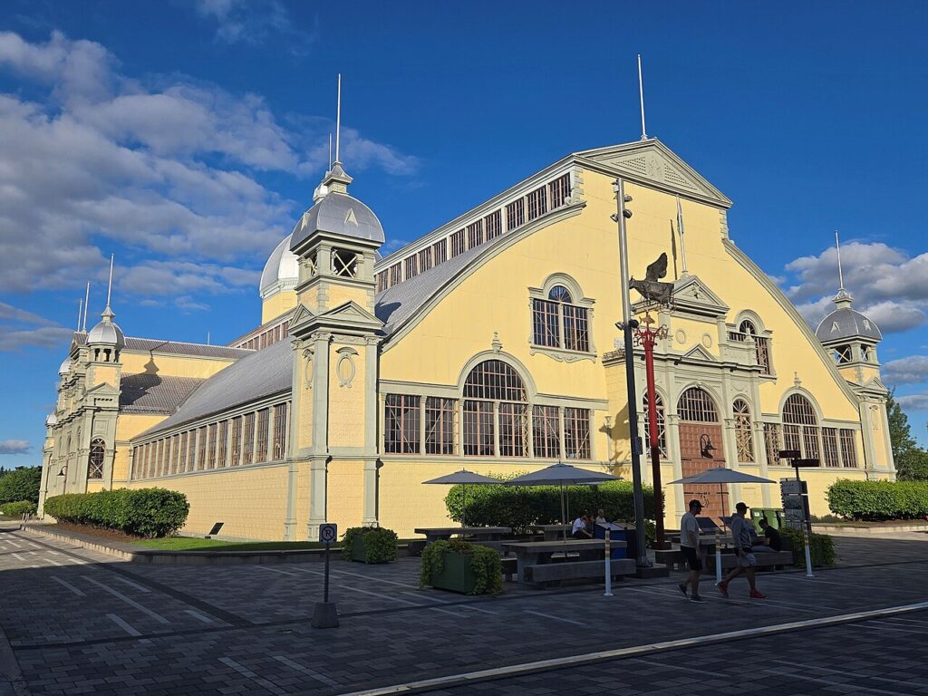 The Aberdeen Pavilion at Lansdowne Park in sunshine under a blue sky.